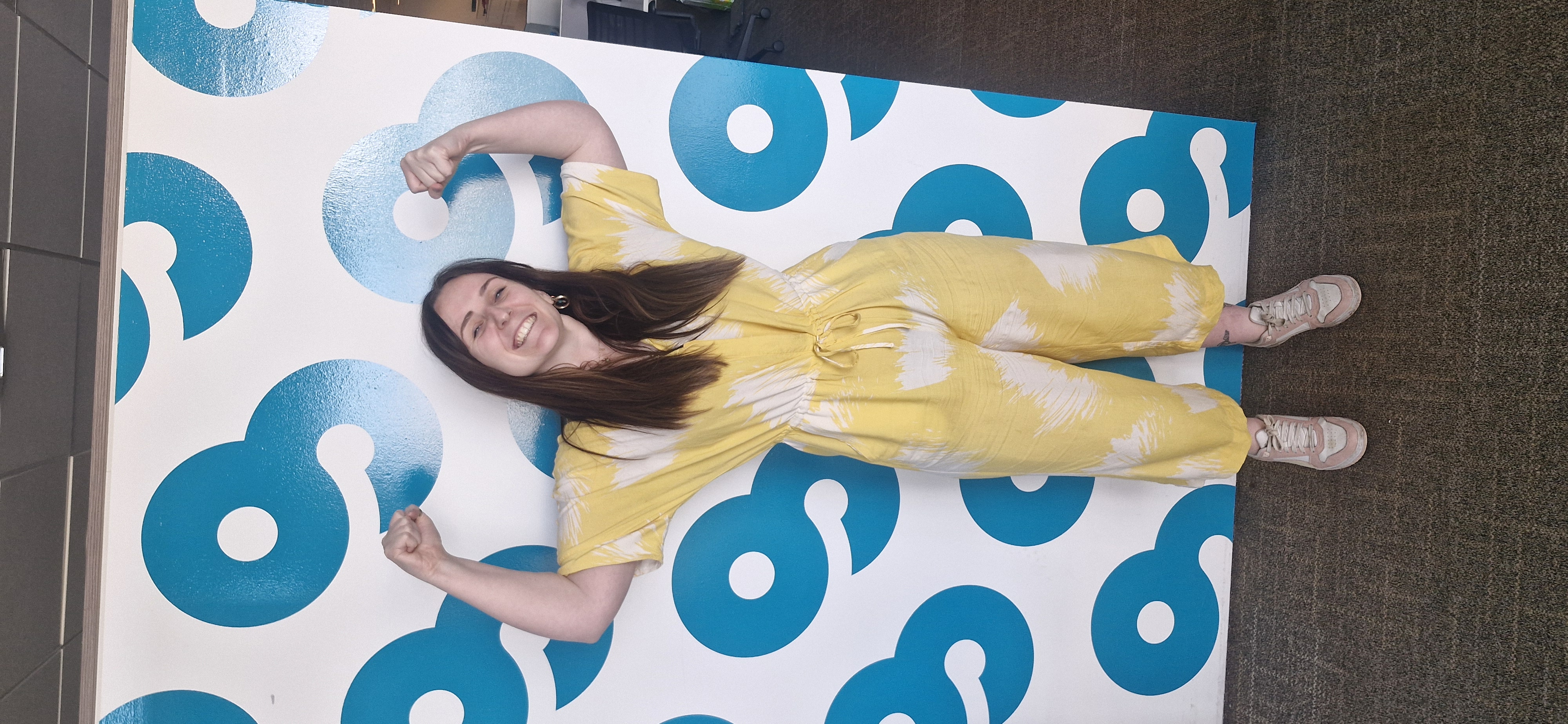 Megan O'Brien, smiling, wearing a Kiltwalk shirt