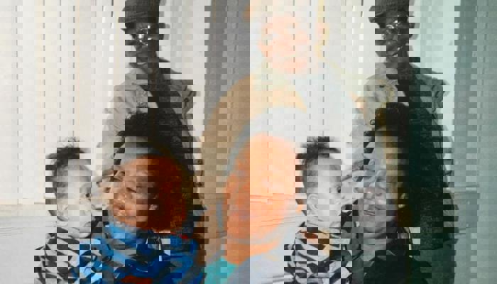 Miles Greenwood with his grandparents. 