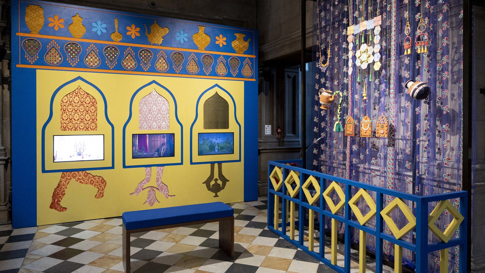 A colourful film installation and ceramic works by Kelvingrove artist-in-residence Aqsa Arif which is called Anam Ki Almari.