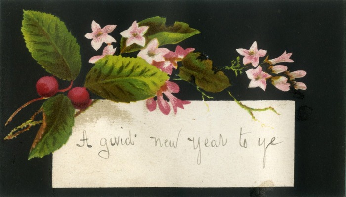 New year card with black background and flowers. "A guid new year to one and all"