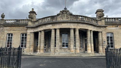 Exterior of a large historic stone library building